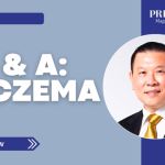Q & A: Eczema article banner from Prime Magazine featuring a smiling man in a suit and tie.