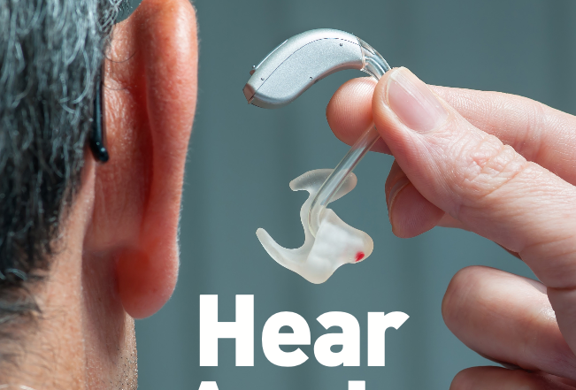 Man wearing a digital hearing aid — hearing loss Singapore treatment and rehabilitation by Dr Lynne Lim, ENT specialist.