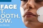 A woman undergoing Emface treatment with applicators on her cheeks, promoting a needle-free facelift for lifting, smoothing, and glowing skin.