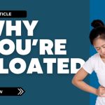 Woman holding her stomach, showing discomfort from bloating.