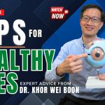 Dr. Khor Wei Boon holding a model of the human eye with text overlay reading “Tips for Healthy Eyes – Expert Advice from Dr. Khor Wei Boon”