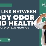 A digital magazine banner from Prime Magazine titled “The Link Between Body Odor and Health: What Your Scent Says About You,” featuring a woman holding her nose and raising her hand to block an unpleasant smell.