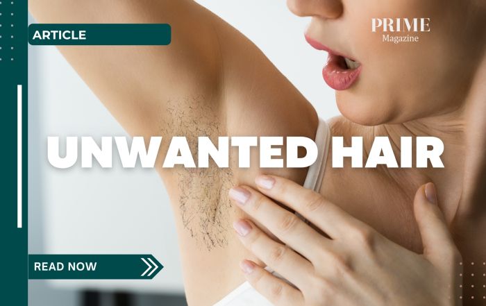 Close-up of a woman surprised by visible armpit hair while checking her underarm.