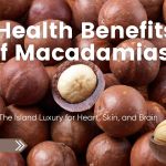 Close-up of macadamia nuts, with one cracked open to reveal the creamy kernel inside, overlaid with the text “Health Benefits of Macadamias: The Island Luxury for Heart, Skin, and Brain.”