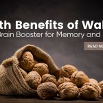 A rustic burlap sack spilling whole walnuts onto a wooden surface, symbolizing the brain and heart health benefits of walnuts.