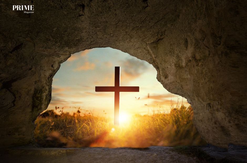 Cross illuminated at sunrise symbolising renewal and transformation