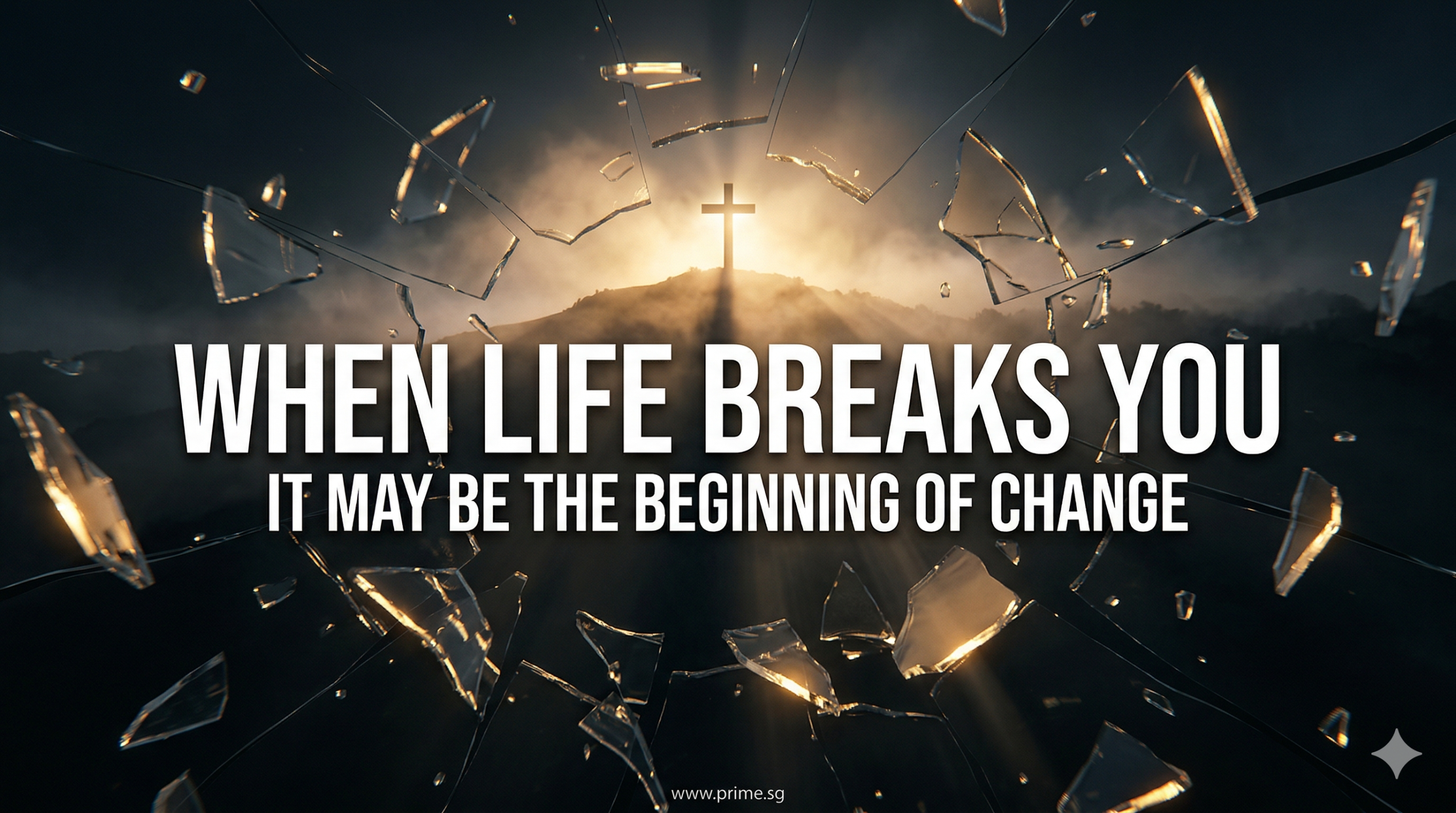 A glowing cross shines through shattered glass with the words “When life breaks you, it may be the beginning of change.”