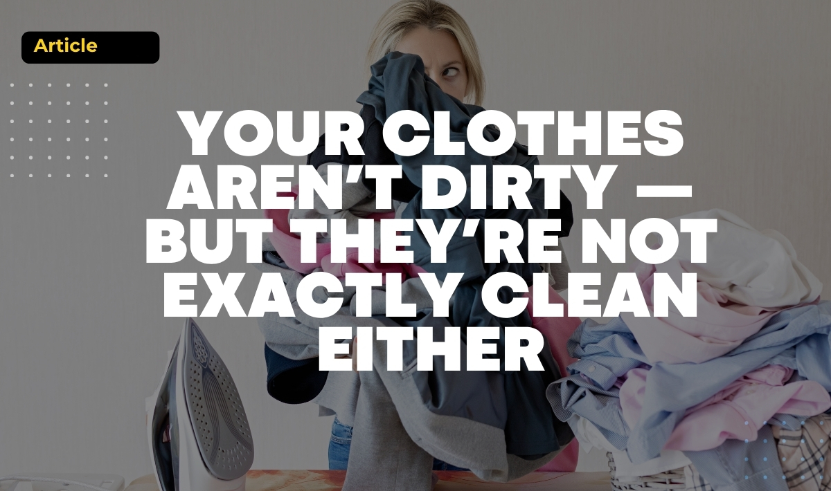 Woman doing laundry at home, highlighting the idea that clothes may look clean but are not always truly fresh