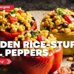 Golden rice-stuffed bell peppers filled with enriched rice, black beans, corn, and vegetables