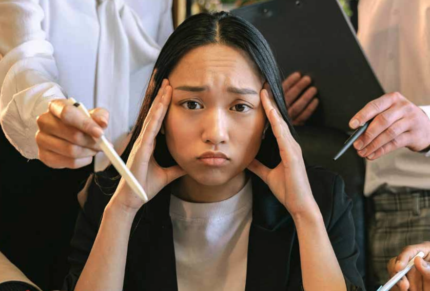 Stressed woman (office pressure)