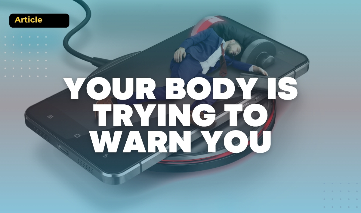 Exhausted man lying on a smartphone plugged into a charger, symbolising burnout, fatigue and low energy from modern lifestyle stress