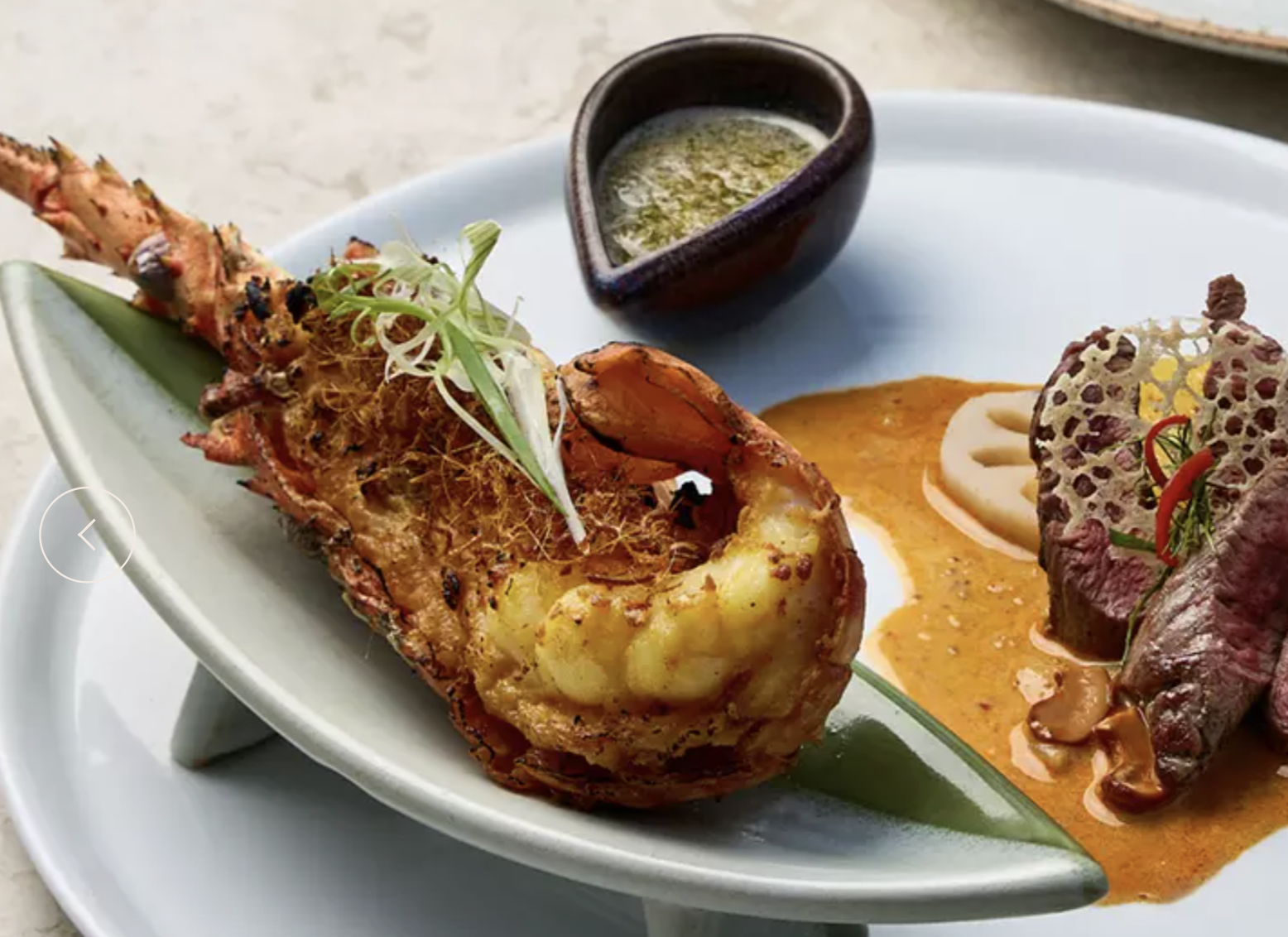 A beautifully plated signature gourmet dish served at EVOL Restaurant at Garrya Tongsai Bay Samui, featuring fresh seafood, premium beef and locally inspired flavours.
